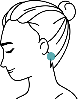 A silhouette of a woman with a bun hairstyle and a large turquoise earring visible on her left ear.